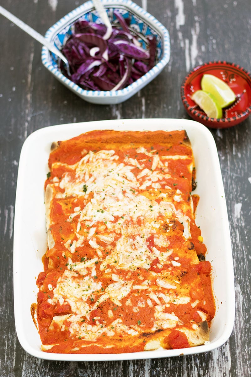 vegetarian black bean enchiladas with lime and cabbage salad