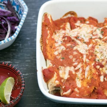 veggie enchiladas with tomato sauce and cheese