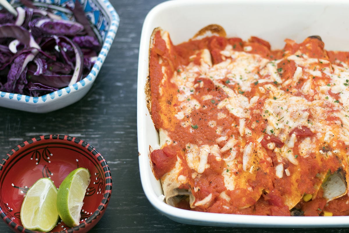 veggie enchiladas with tomato sauce and cheese