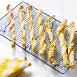 butternut squash cheese straws on cooling rack
