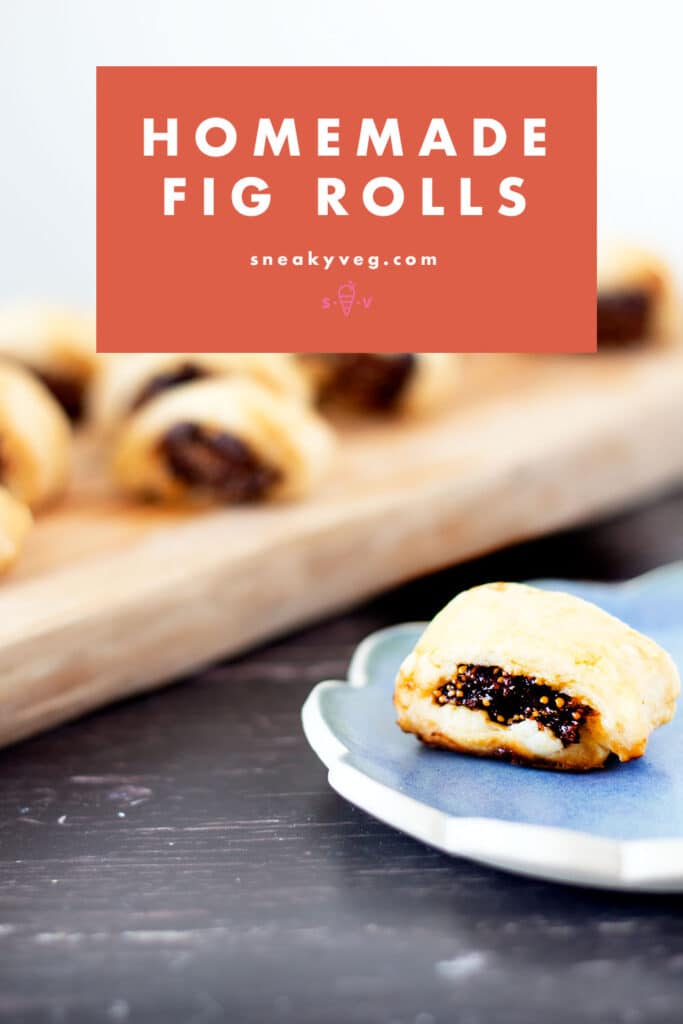 homemade fig roll on blue plate with board and more fig rolls in background