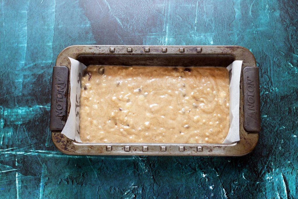 unbaked banana bread in loaf tin