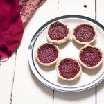 healthy raspberry jam tarts on plate