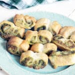 green plate with spinach pastry palmiers
