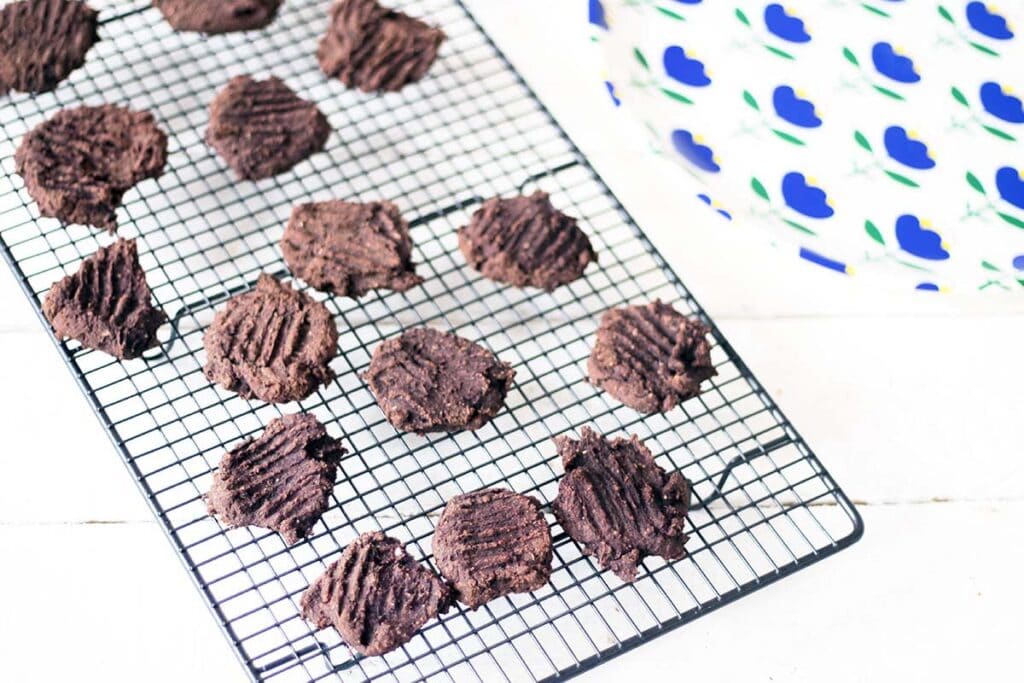 chocolate black bean beetroot cookies on wire rack