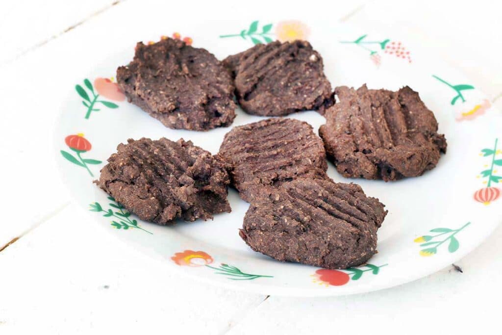 chocolate black bean beetroot cookies on plate