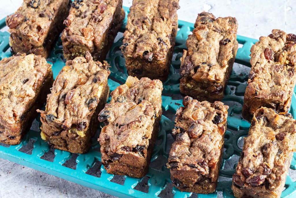 uniced simnel cakes on green dish