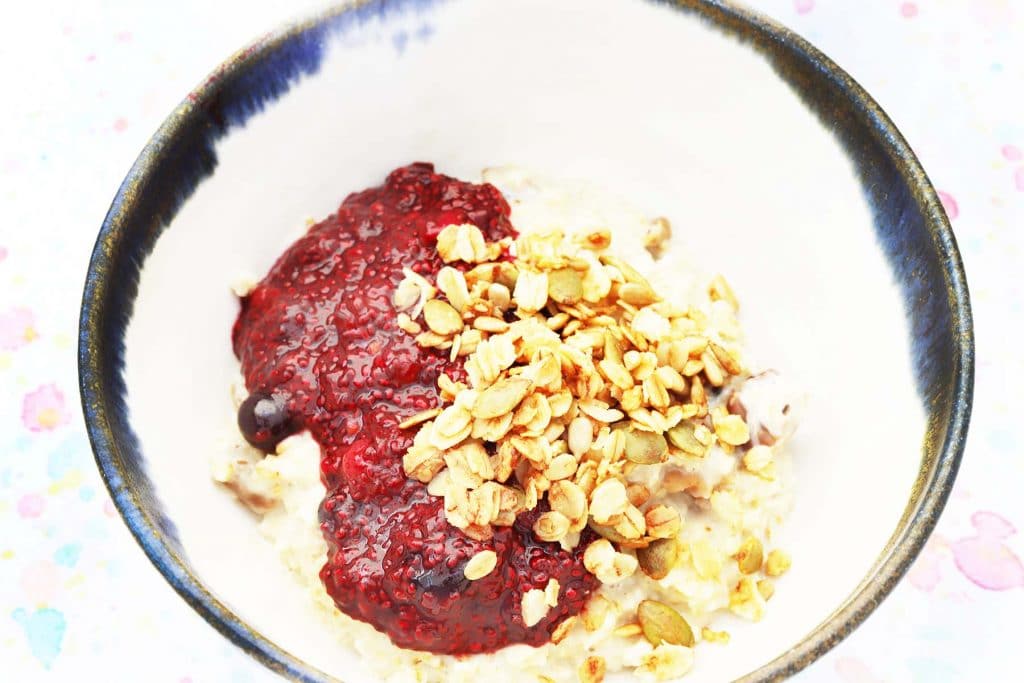 berry chia jam and granola in bowl