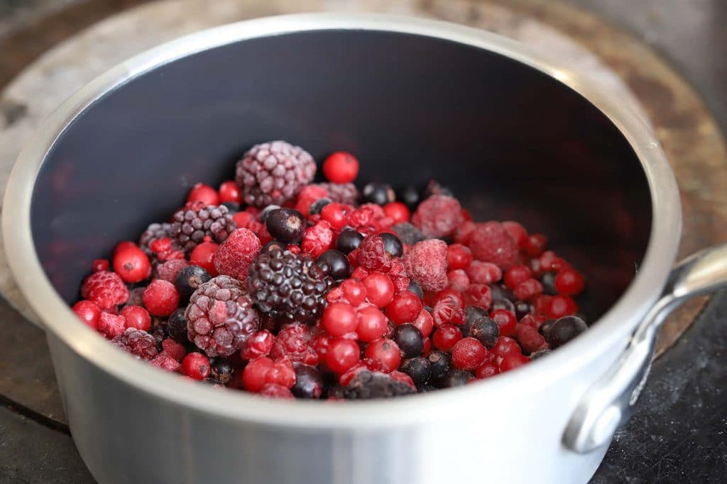 frozen berries in saucepan