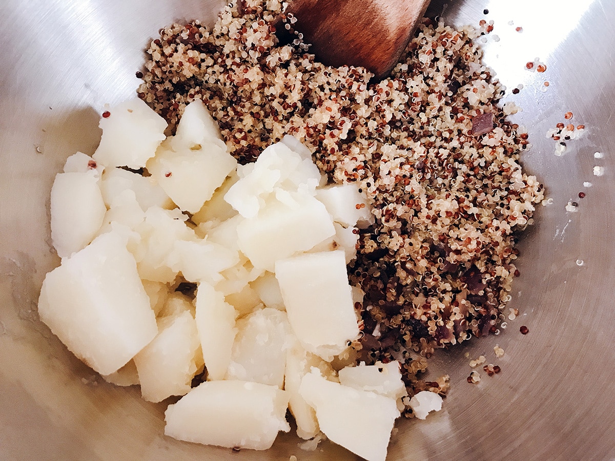 potatoes, quinoa and onion in bowl