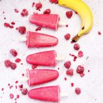 pink ice lollies with banana and raspberries