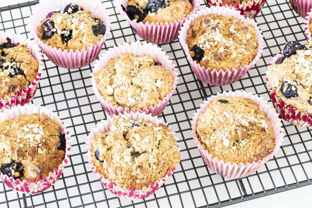 vegan banana and blueberry muffins on cooling rack