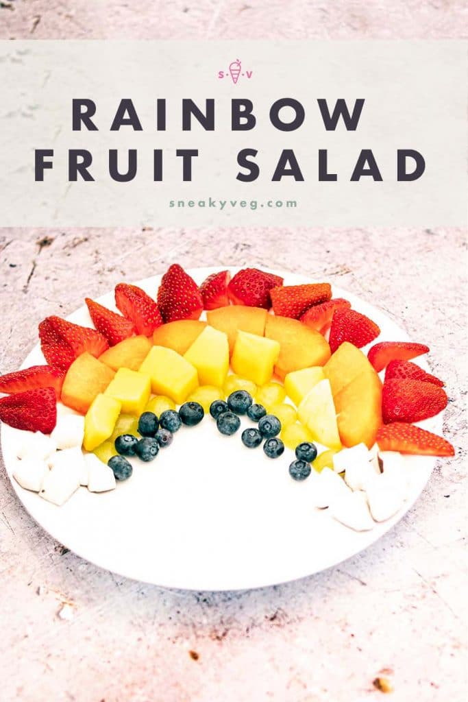 rainbow fruit salad on white plate