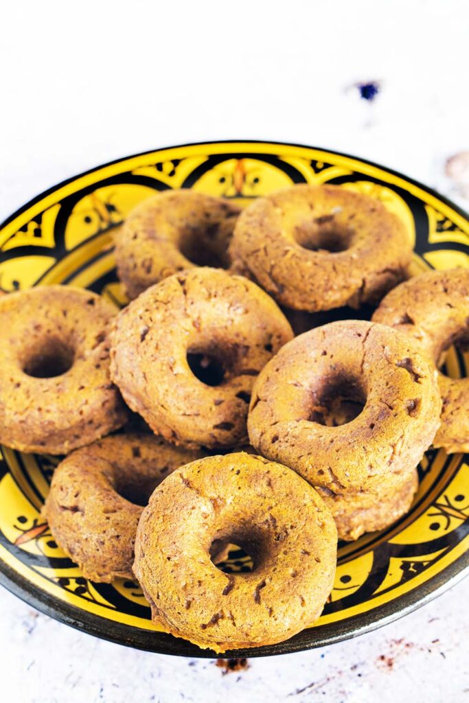 vegan pumpkin doughnuts in yellow Moroccan bowl