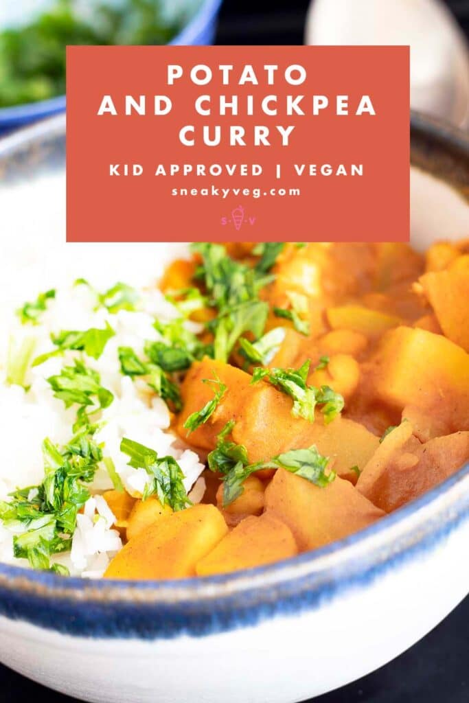 potato chickpea curry in bowl with rice and bowl of coriander in background