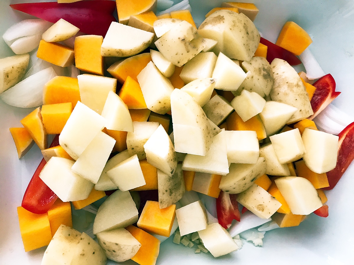 chopped onion, garlic, ginger, potato, squash, red pepper