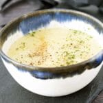 parsnip and apple soup in blue and white bowl
