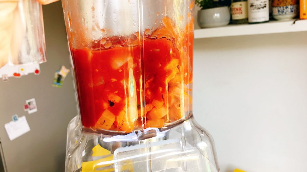 tomato sauce and roast carrots in blender