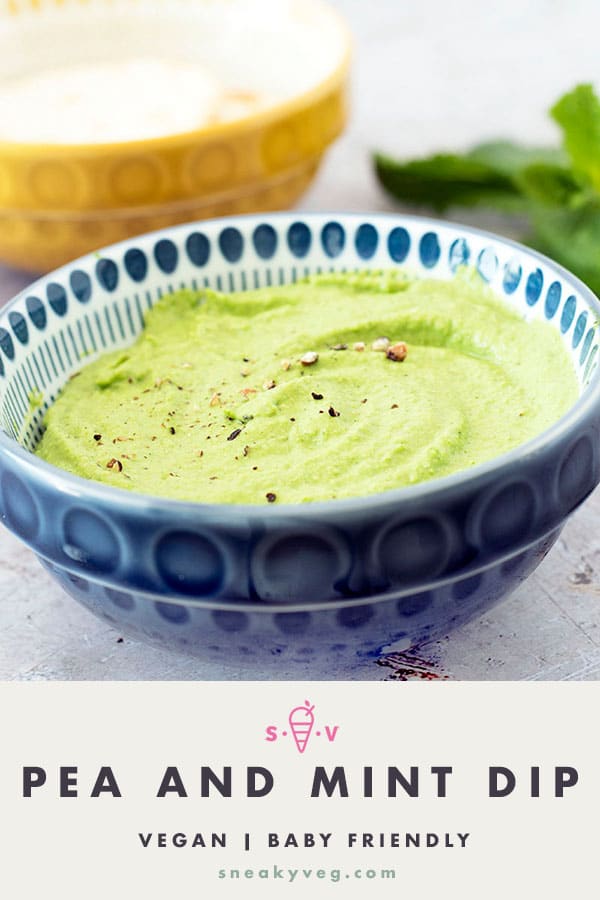 Pea and mint dip in blue bowl with mint sprigs and yellow bowl in background