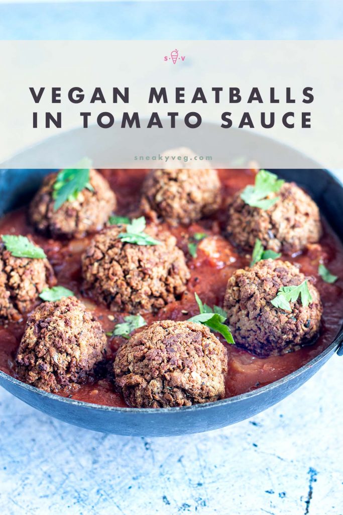vegan meatballs in tomato sauce in black pan