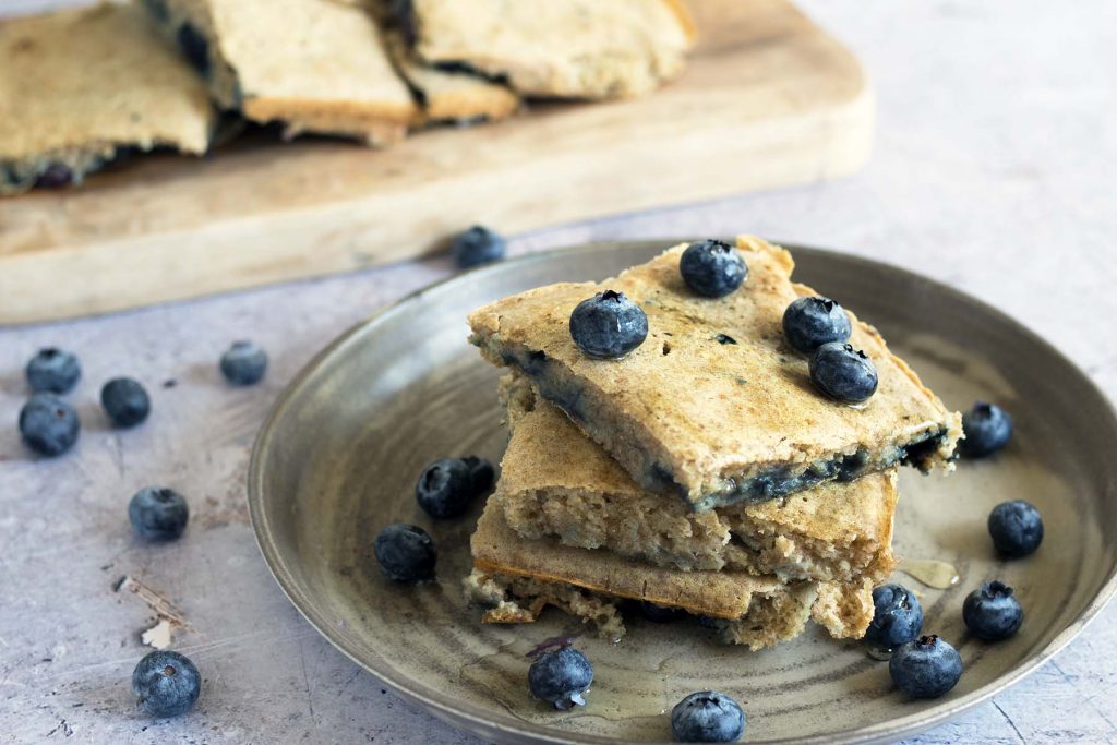 oven baked blueberry pancakes on ceramic plate
