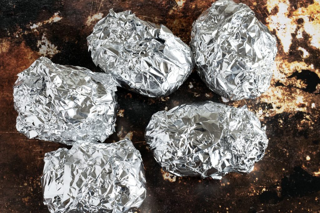 potatoes wrapped in foil on bbq