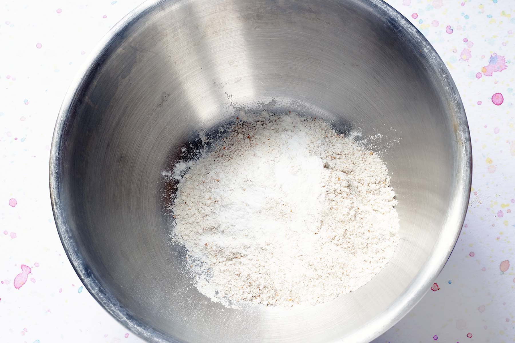 flour, baking powder, bicarbonate of soda in mixing bowl
